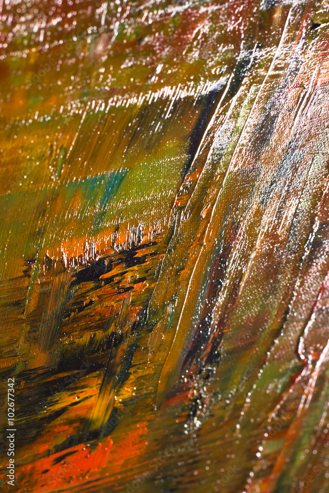 Abstract painted canvas. Oil paints on a palette.