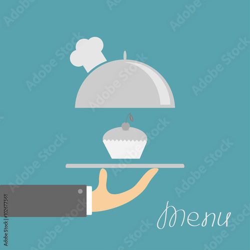 Hand holding silver platter cloche with chefs hat. Menu card. Blue background. Flat design.