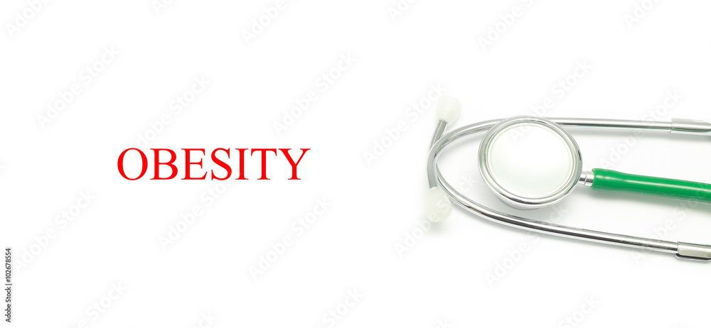 Close up Stethoscope and words Obesity over white background