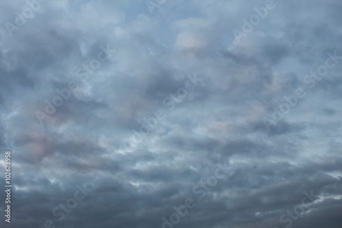 Blue, dark, gray clouds.Sunset. Background