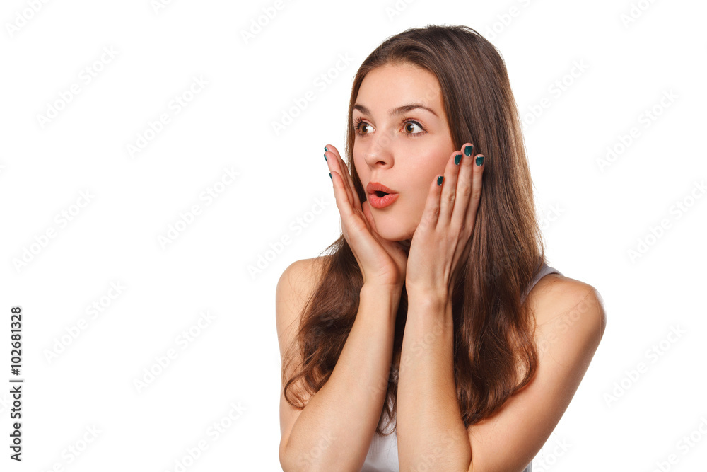 Surprised happy beautiful woman looking sideways in excitement, isolated on white background Surprised happy beautiful woman looking sideways in excitement, isolated on white background