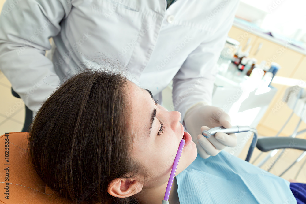 Healthy teeth patient at dentist office dental caries prevention.