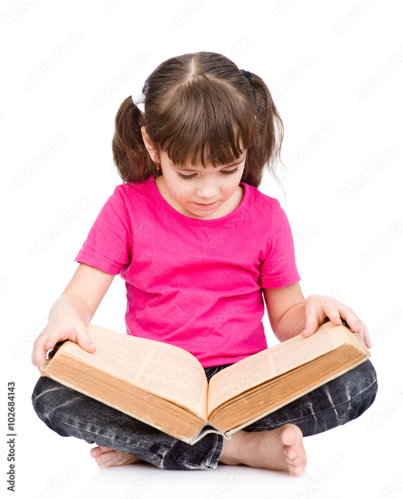 little schoolgirl reading big book. isolated on white background little schoolgirl reading big book. isolated on white background