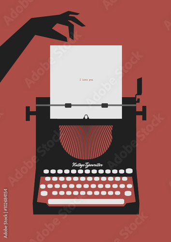 Old Typewriter with hand and paper photo