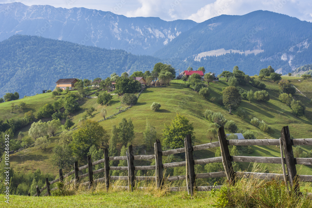 Landscape of Magura village houses and hills with the Carpathian