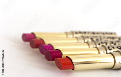 Lipsticks on white background 