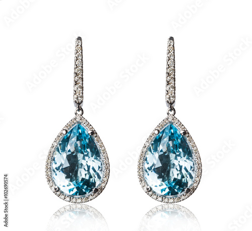 Pair of diamond earrings, isolated on white