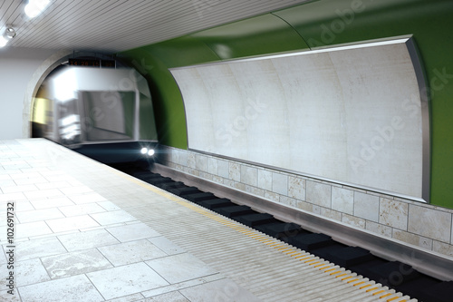 Blank grey billboard on green subway wall and moving train  mock