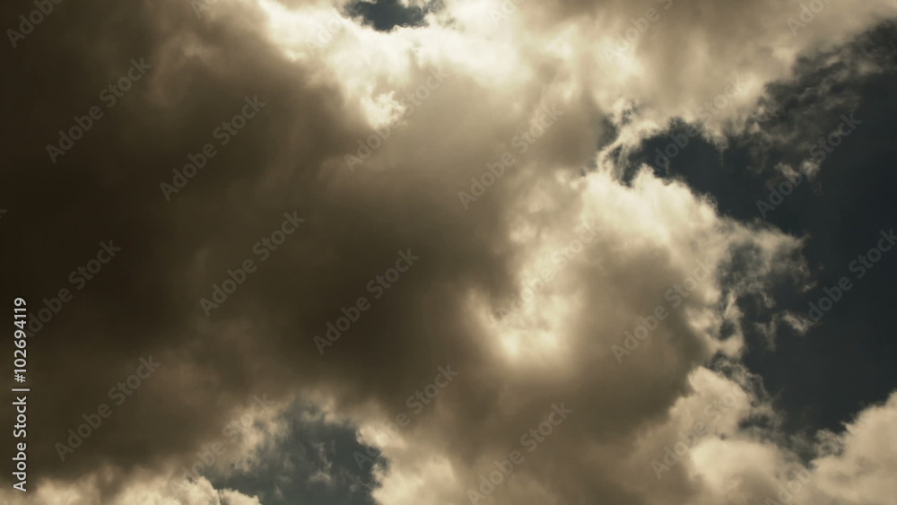 Clouds 1302: Time lapse rain clouds roil and fly across a slate blue sky. Clouds 1302: Time lapse rain clouds roil and fly across a slate blue sky.