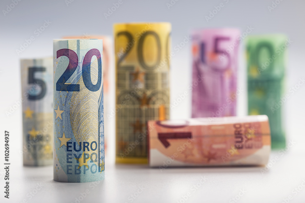 Several hundred euro banknotes stacked by value.Rolls Euro banknotes.Euro currency money.Announced cancellation of five hundred euro banknotes. Banknotes stacked on each other in different positions Several hundred euro banknotes stacked by value.Rolls Euro banknotes.Euro currency money.Announced cancellation of five hundred euro banknotes. Banknotes stacked on each other in different positions