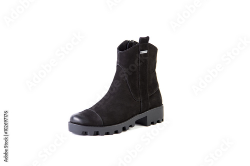 Suede women's boots on a white background, black shoes, autumn and winter