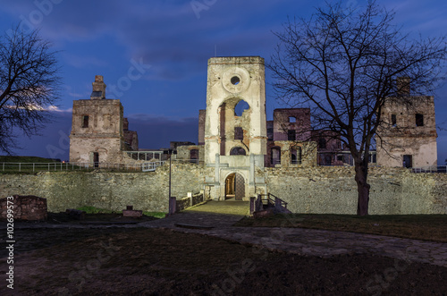 Ruins of baroque castle Krzyztopor in Ujazd, Poland, illuminated in the night photo