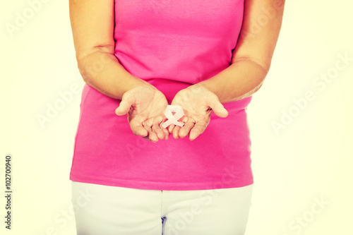 Wallpaper Mural Senior woman with breast cancer awareness ribbon Torontodigital.ca