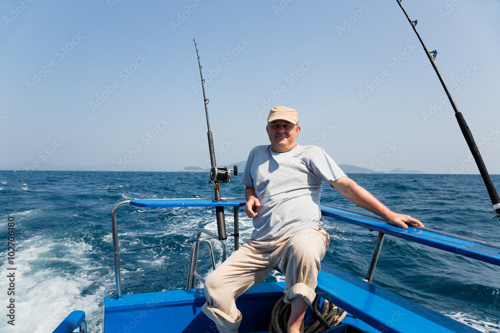 Naklejka premium Fisherman fishes tuna trolling in the Andaman Sea