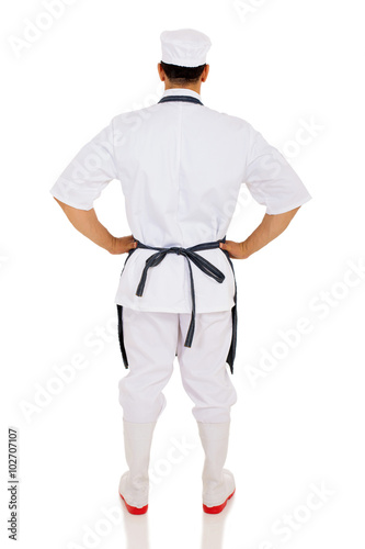 rear view of male chef