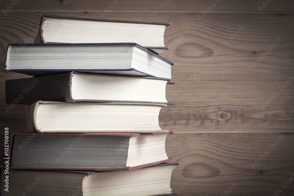 Old book on wooden background. Old book on wooden background.