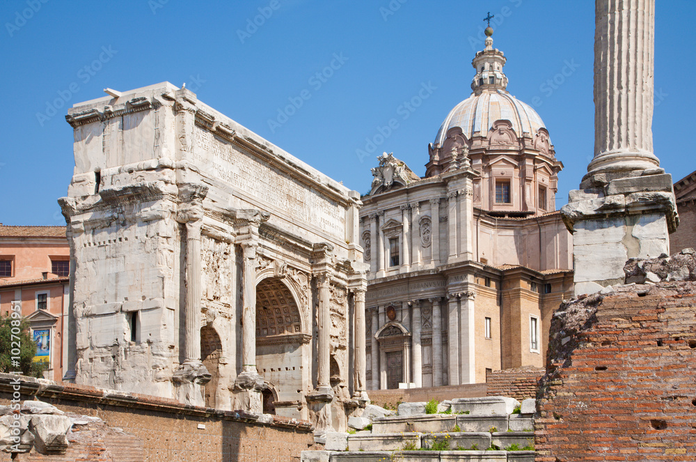 Rome - Forum romanum and the Triumph arch of Septimus Severus and st. Lucke chruch.