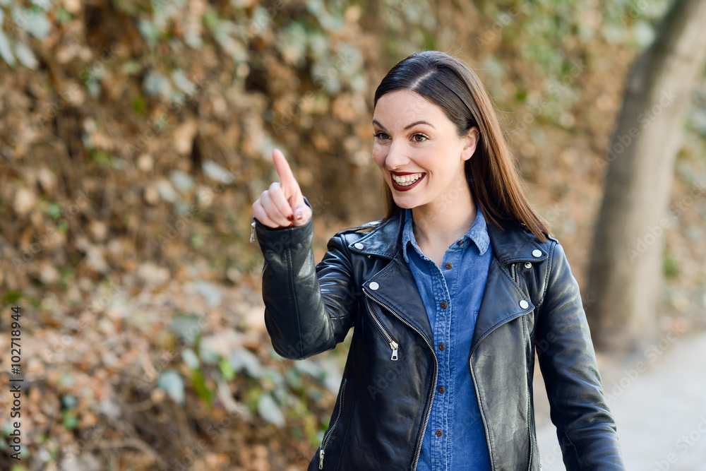 Young woman wearing casual clothes in urban background Young woman wearing casual clothes in urban background