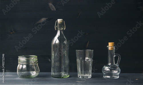 Glass plate on wooden background