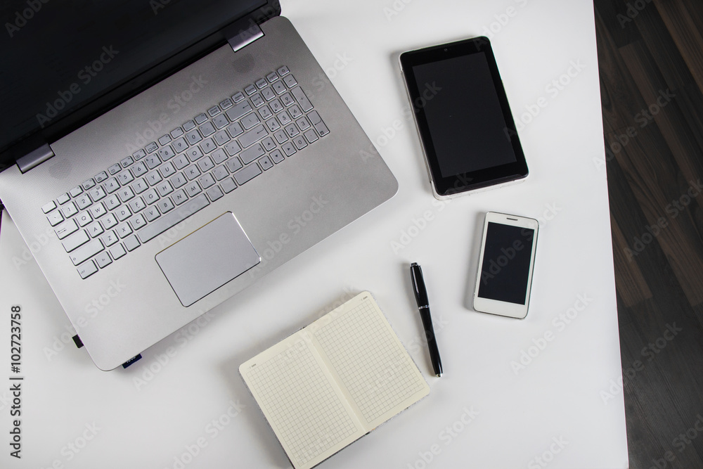 table with laptop and notebook table with laptop and notebook