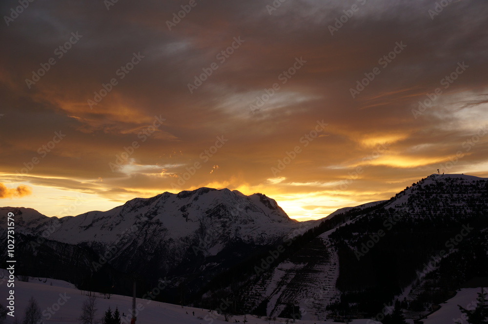 Obraz premium Coucher de soleil sur les Alpes