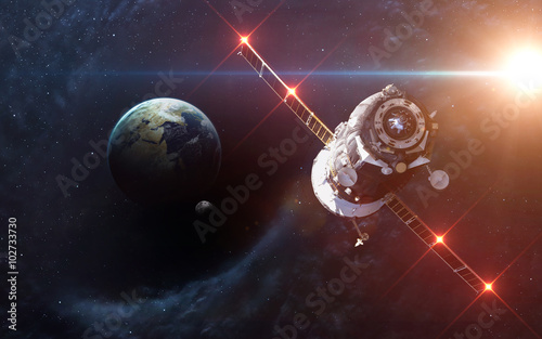 Fototapeta Naklejka Na Ścianę i Meble -  Black hole in space, earth and spacecraft. Elements of this image furnished by NASA