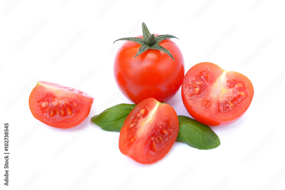 Fresh tomato with basil isolated on white background Fresh tomato with basil isolated on white background