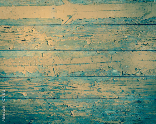 Old wood with paint peeling off. Old wooden background  texture