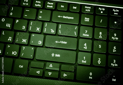 Electronic collection - laptop keyboard. The focus on the Enter photo