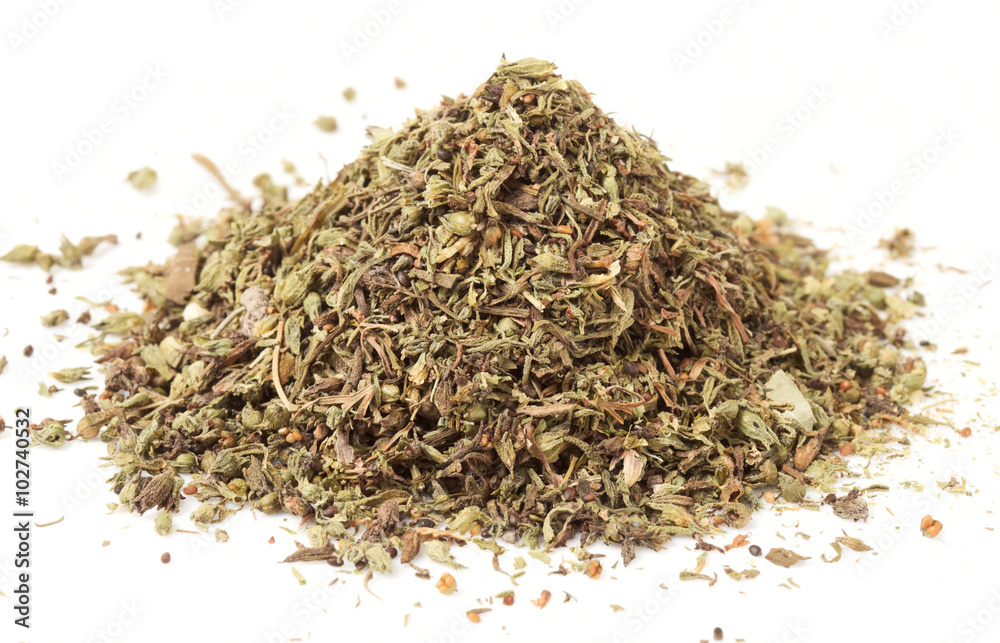 Heap of dried herbal seasoning, macro shot, isolated Heap of dried herbal seasoning, macro shot, isolated