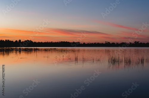 sunset at coast of the lake © tothekop79