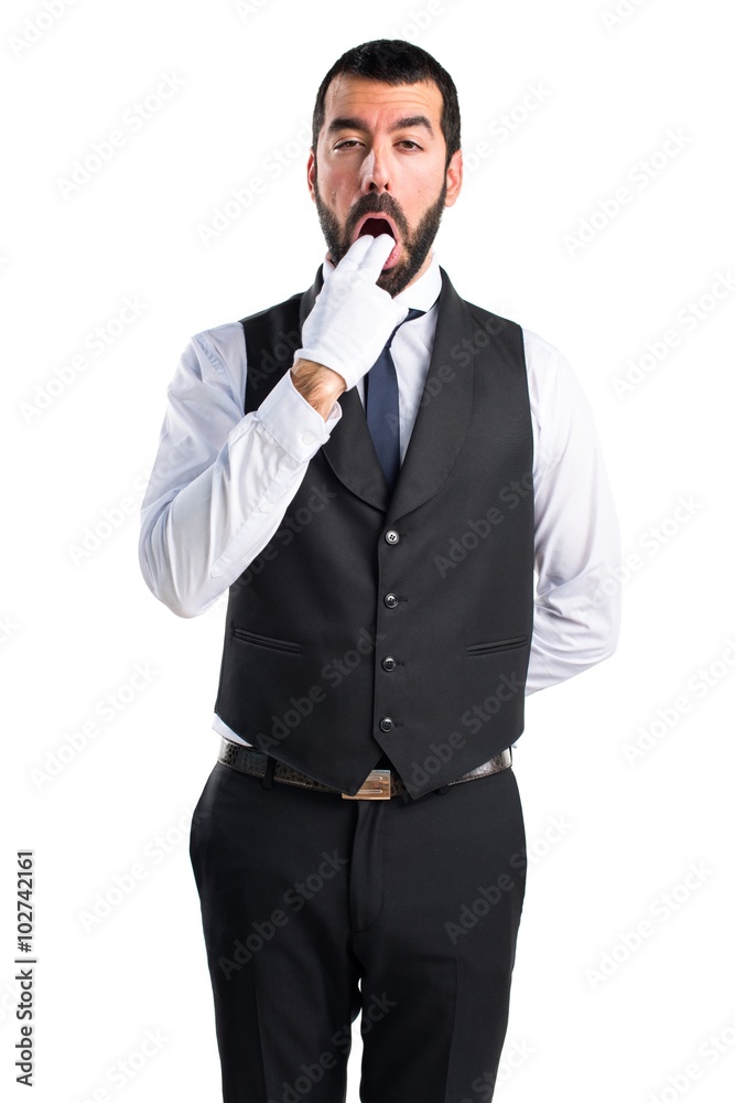 Luxury waiter doing vomiting gesture Luxury waiter doing vomiting gesture