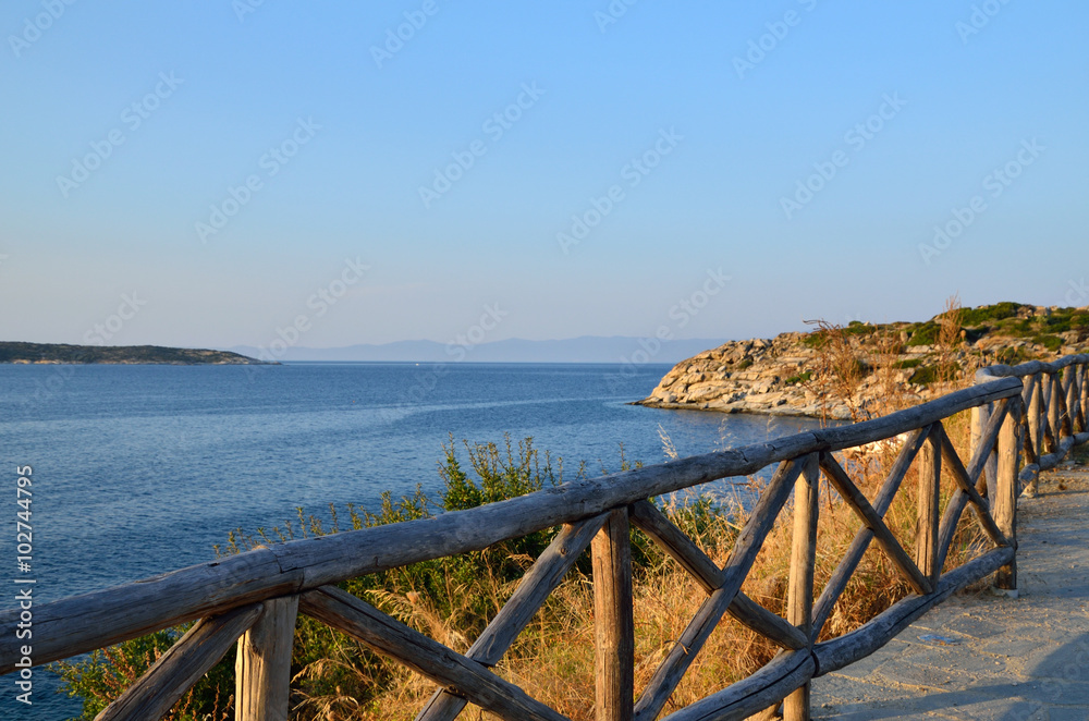 Fototapeta premium Fence and Blue Sea
