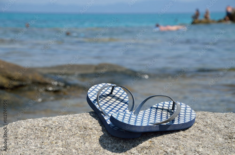 Obraz premium Flip-flops on the Beach