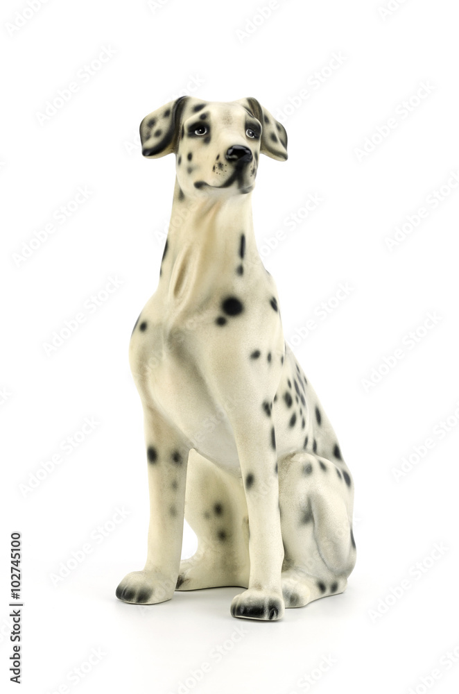 Statuette of dog  isolated on white background