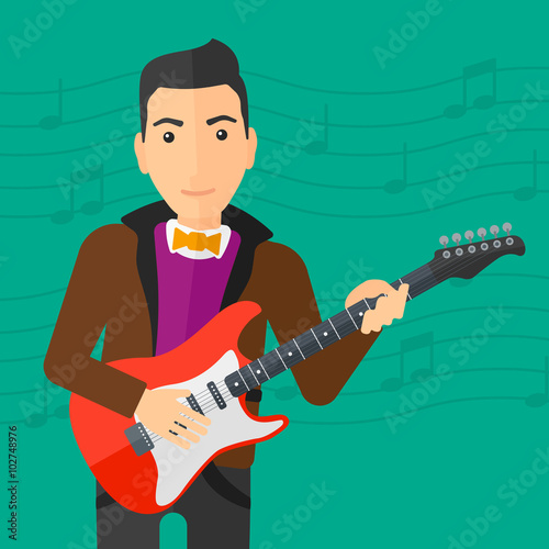 Musician playing electric guitar.