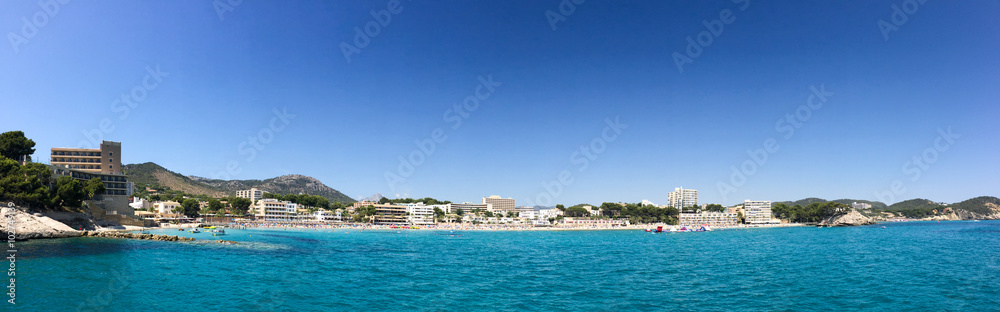 Panoramic wide view of vacation spot from ocean