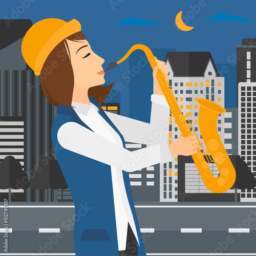 Woman playing saxophone.