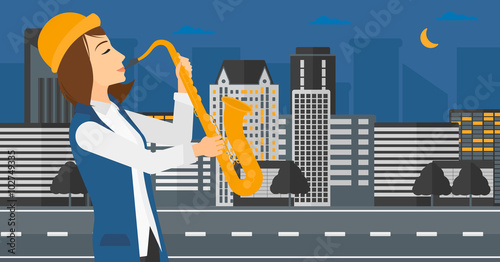 Woman playing saxophone.