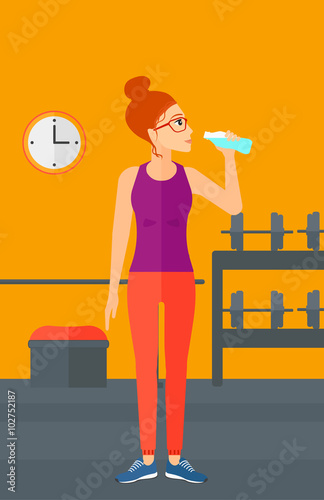 Woman drinking water.