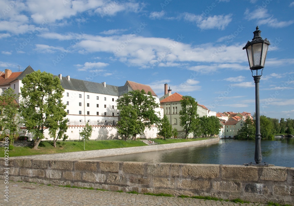 Medieval Town Pisek with castle from historic stone bridge over  river Otava in the Southern Bohemia, 