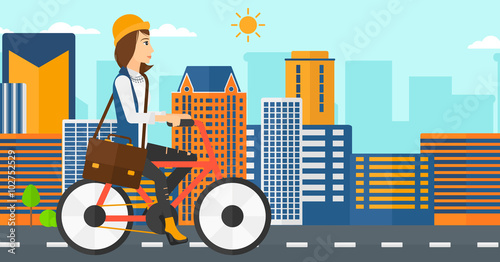 Woman cycling to work. © Visual Generation