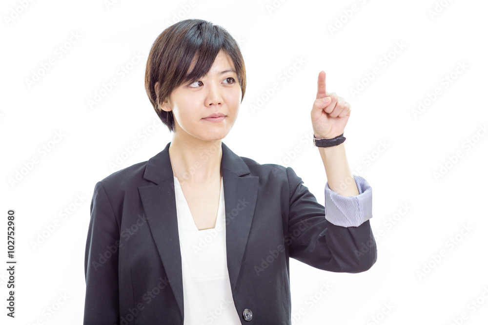 Asian businesswoman pressing invisible screen Asian businesswoman pressing invisible screen