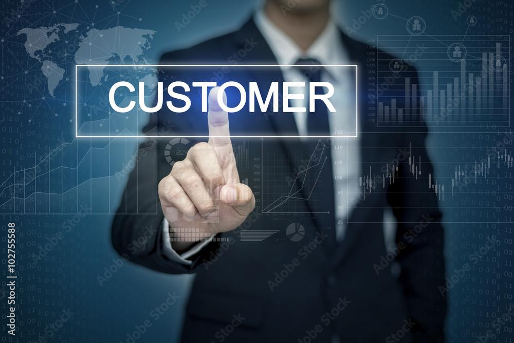 Businessman hand touching CUSTOMER button on virtual screen Businessman hand touching CUSTOMER button on virtual screen