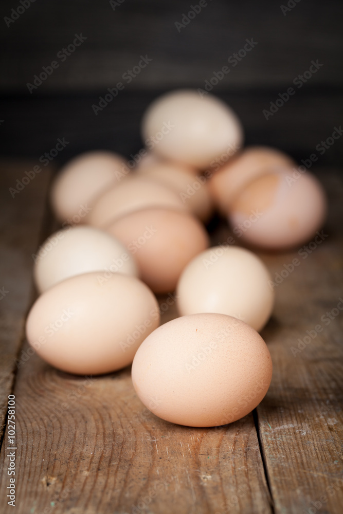 Chicken fresh brown eggs on wooden rustic table Chicken fresh brown eggs on wooden rustic table