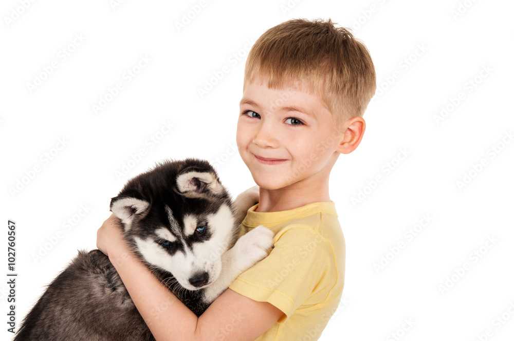 Boy with a puppy husky