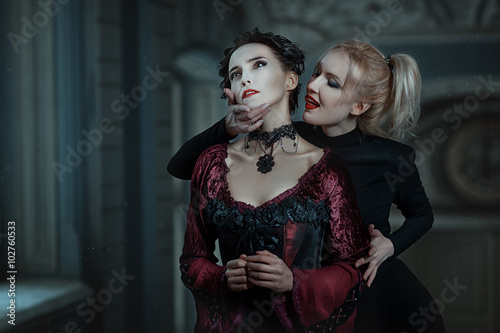 Woman vampire bites. photo