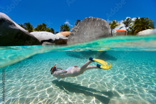 Woman snorkeling at tropical water © BlueOrange Studio