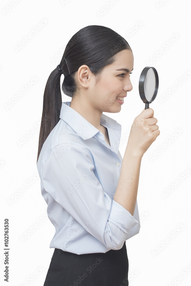 business woman look in Magnifier isolated on white background, a business woman look in Magnifier isolated on white background, a
