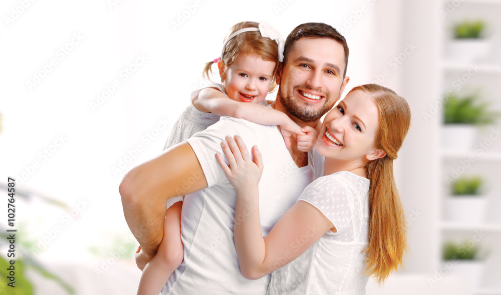 happy family mother, father,  child at home